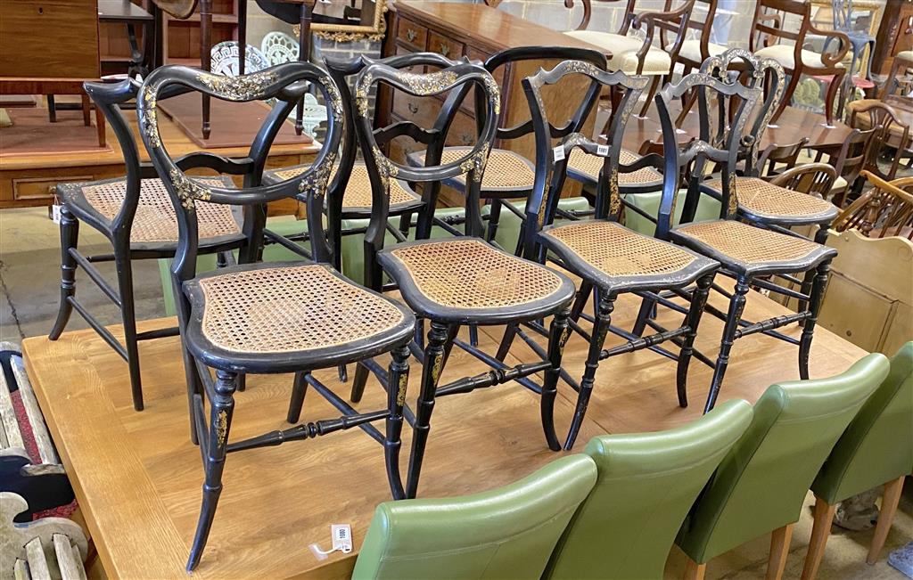 Nine Victorian mother of pearl inlaid lacquered caned seat side chairs